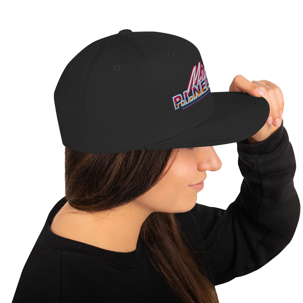 Black flat-brim snapback hat with embroidered Miami P.I.NEAPPLE pineapple logo